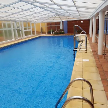 En Primera Linea De La Playa Rapadoira アパート